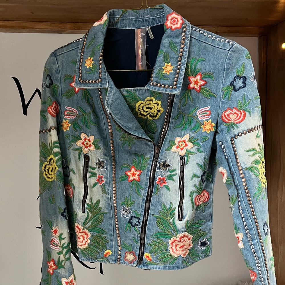 Denim jacket embroidered by Aratta.  Moto style